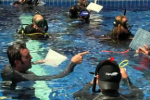 padi idc staff assisting by padi idc course